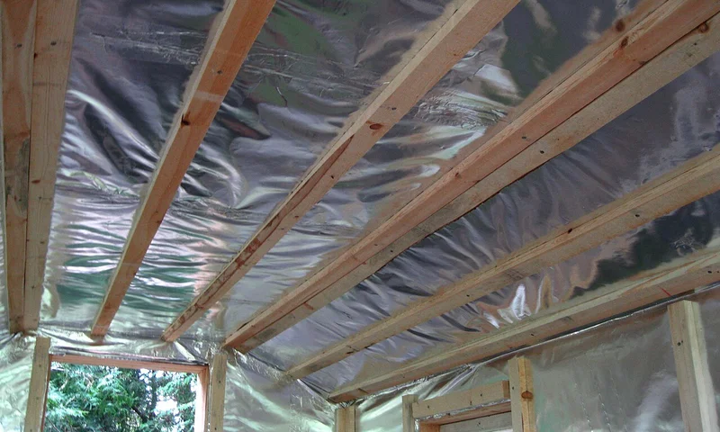 Basement vapour barrier on framed walls and ceiling