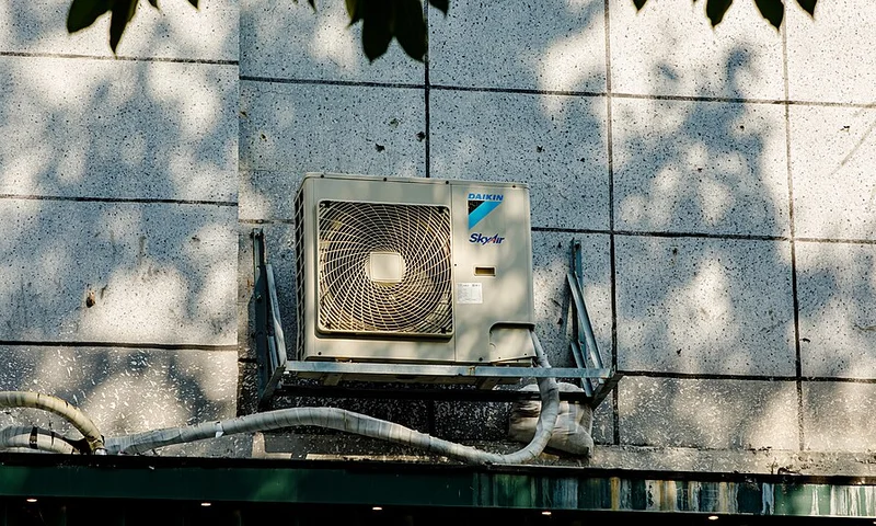 Central AC outdoor condenser install at a house