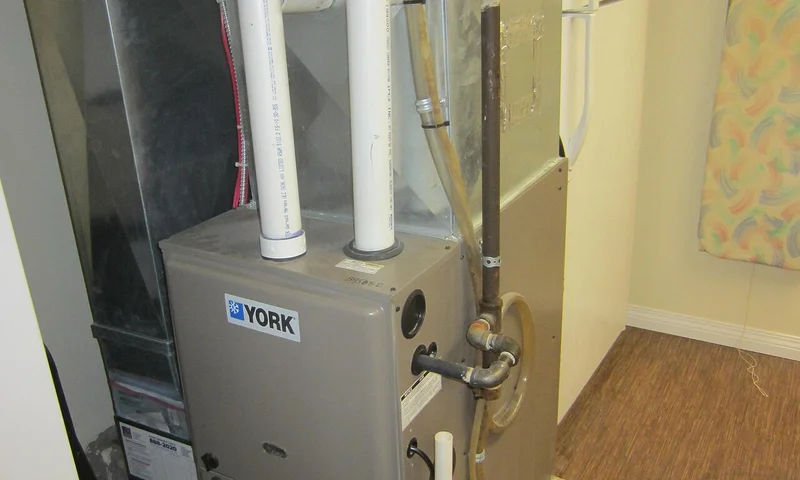High-efficiency condensing gas furnace with PVC venting