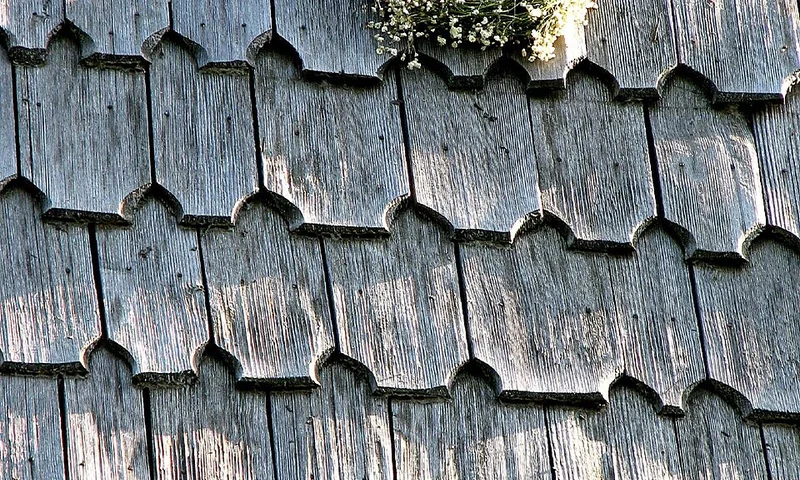Snow and ice on a residential roof eave
